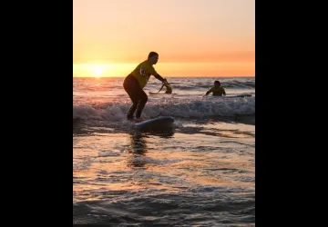 Surf coucher de soleil