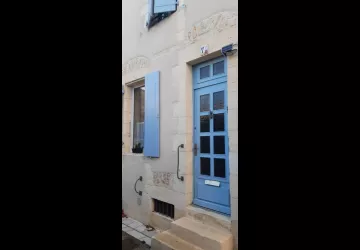 Maison roses trèmières